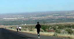 Runners make their way over the Montano Bridge at the 2002 MAD Mile.