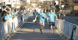 Two Runners Battle to Finish Line